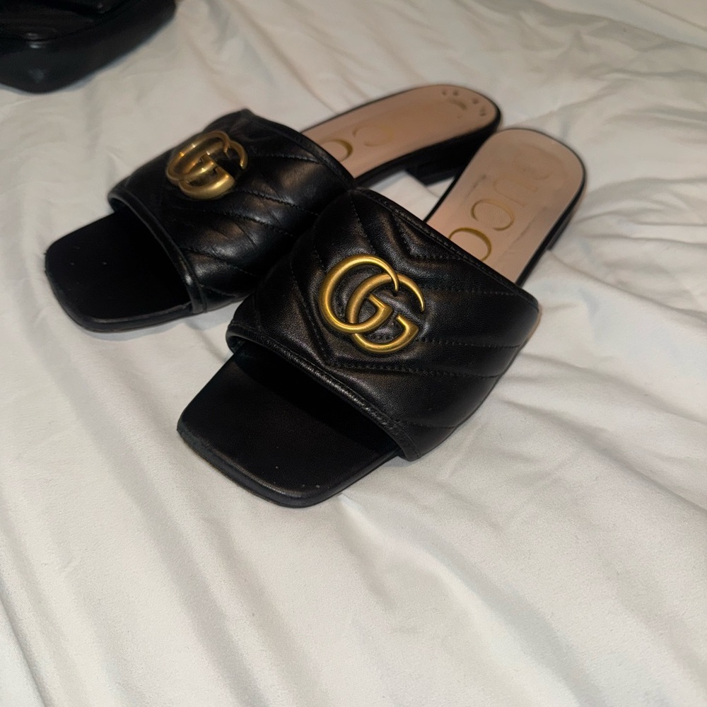 Gucci Black and Gold Sandals with Iconic GG Logo